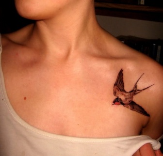 A-small-swallow-tattoo-on-the-left-shoulder-a-popular-symbol-for-travelers-and-adventurers